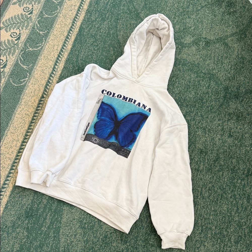 White Hoodie with Blue Butterfly Graphic